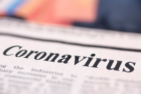 Krantenkop met coronavirus